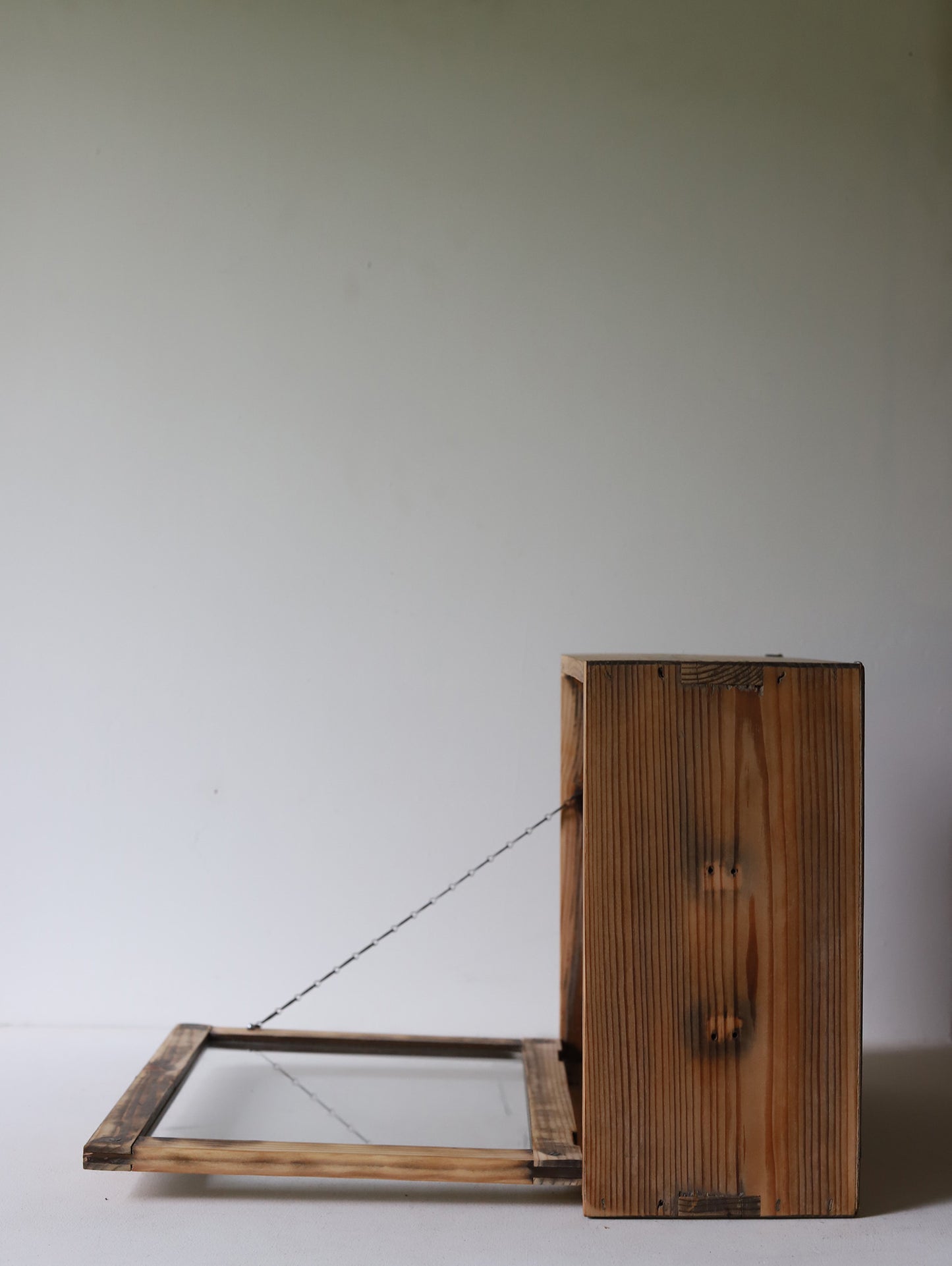 WALL MOUNTED GLASS CABINET